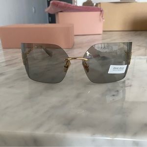 MiuMiu Runway Frameless Sunglasses in Dark grey color